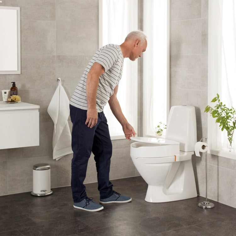 WC-istuimen korottaja 10cm kannella (reunasuojat)